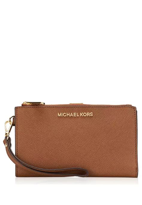 michael kors jet set travel wristlet brown|mk double zip wristlet.